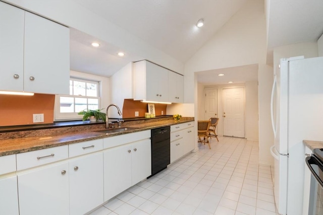 kitchen with dishwasher, lofted ceiling, sink, white cabinets, and white fridge