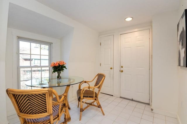 dining room featuring light tile patterned flooring