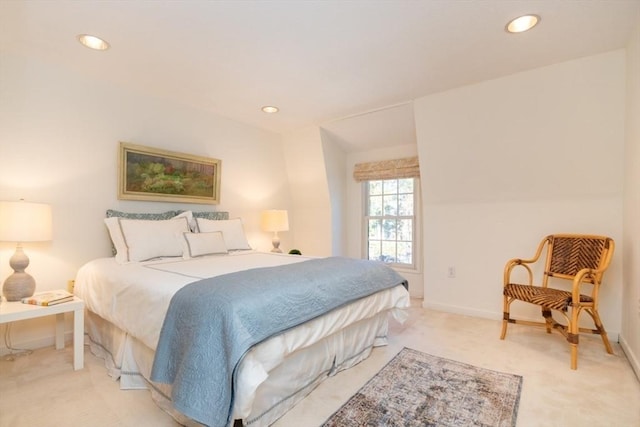 bedroom featuring light colored carpet