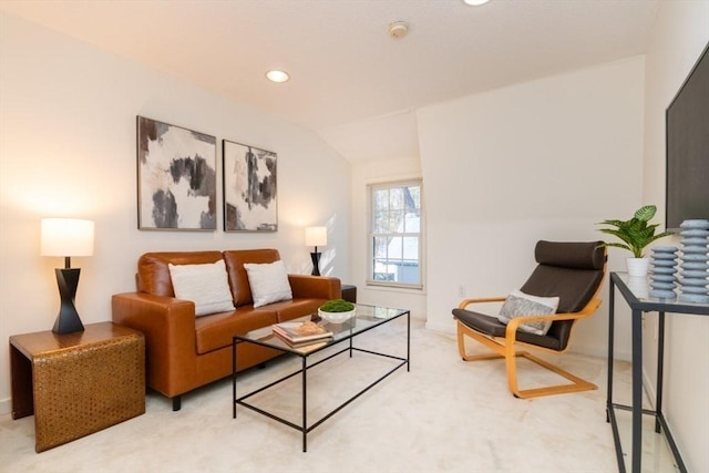 living room with lofted ceiling and carpet flooring