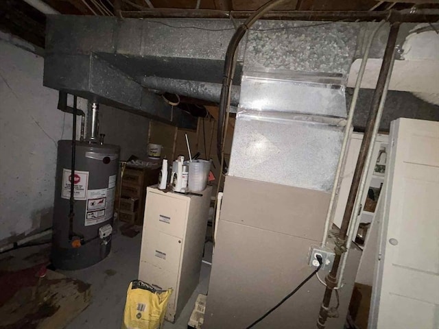 27 Hilton Ter, Boston, MA 02119 - utility room featuring gas water heater and heating unit