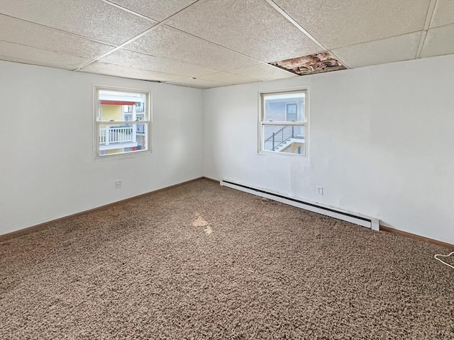 498 N End Blvd, Salisbury, MA 01952 - carpeted spare room with a baseboard radiator and a paneled ceiling