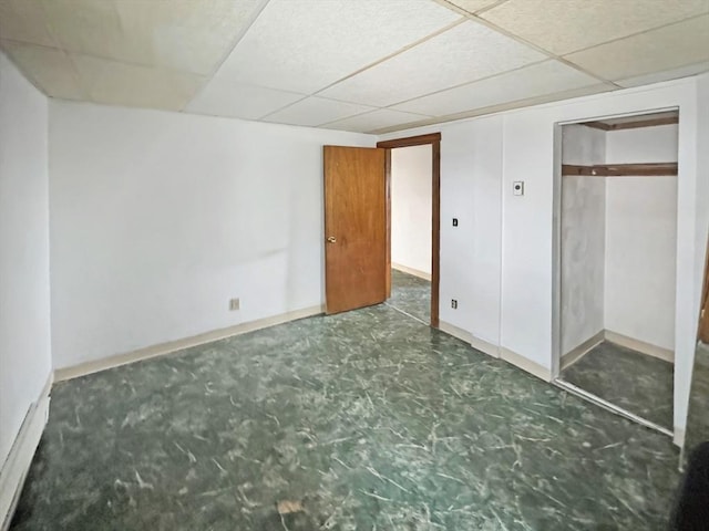 498 N End Blvd, Salisbury, MA 01952 - unfurnished bedroom with a paneled ceiling, tile patterned floors, and a closet