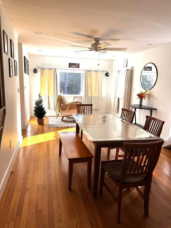 dining room featuring ceiling fan and light hardwood / wood-style flooring