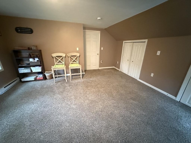 sitting room featuring baseboards, lofted ceiling, baseboard heating, and carpet floors