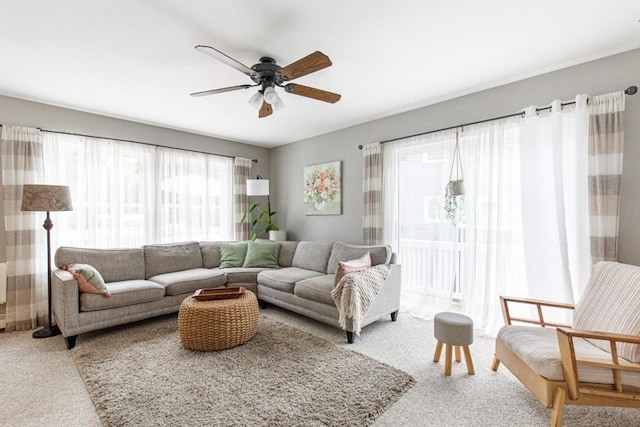 42 Guillotte St, Acushnet, MA 02743 - living room with carpet flooring, healthy amount of natural light, and a ceiling fan