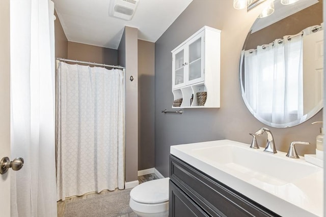 42 Guillotte St, Acushnet, MA 02743 - full bath with toilet, vanity, baseboards, and curtained shower