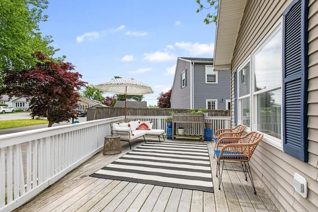 42 Guillotte St, Acushnet, MA 02743 - wooden terrace featuring an outdoor hangout area