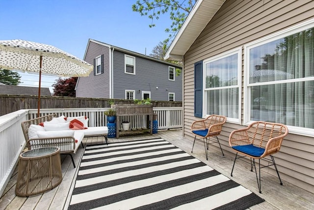 42 Guillotte St, Acushnet, MA 02743 - wooden terrace with an outdoor hangout area