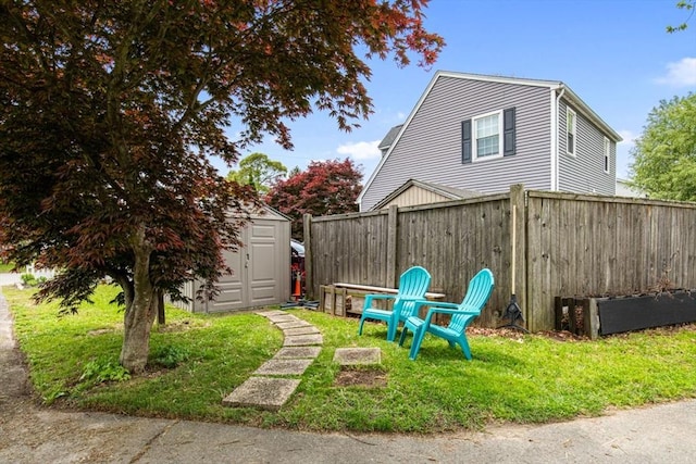 42 Guillotte St, Acushnet, MA 02743 - view of yard with a storage unit and an outbuilding