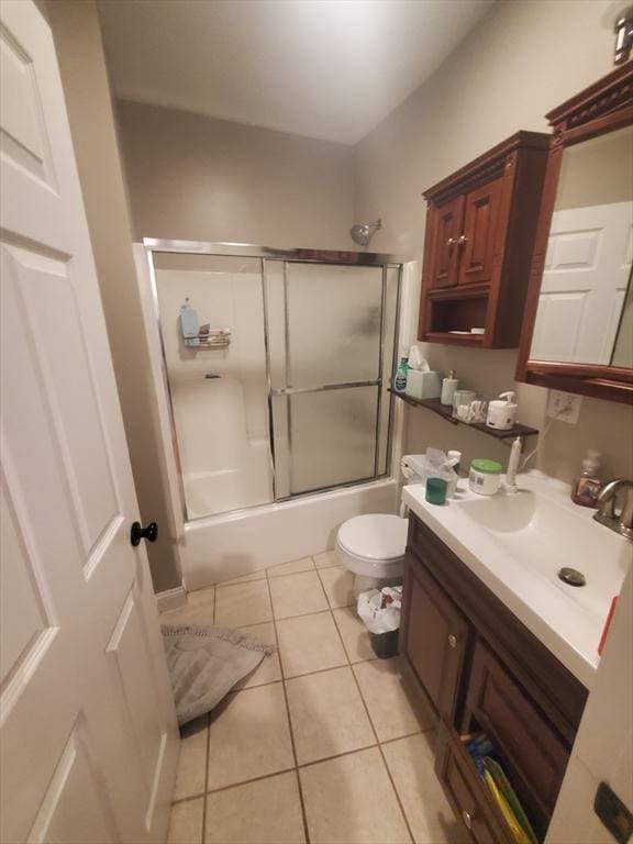 279-279A Dorchester St, Boston, MA 02127 - full bath with vanity, shower / bath combination with glass door, tile patterned flooring, and toilet