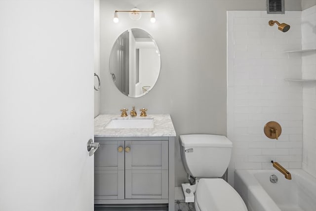 bathroom featuring vanity, toilet,  shower combination, and visible vents