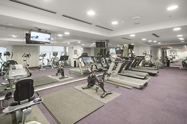 workout area with carpet floors and visible vents