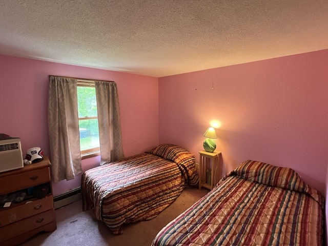19 Wheelhouse Cir, Falmouth, MA 02536 - bedroom with baseboard heating, carpet flooring, and a textured ceiling