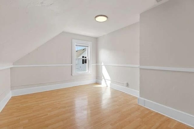 9 Foster St Unit 2, Gloucester, MA 01930 - bonus room with lofted ceiling and wood finished floors