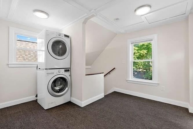 9 Foster St Unit 2, Gloucester, MA 01930 - laundry area featuring stacked washer / drying machine, dark colored carpet, and attic access