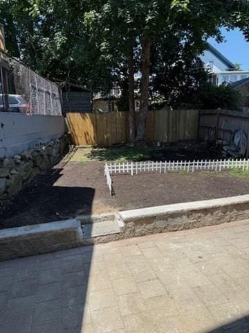 9 Foster St Unit 2, Gloucester, MA 01930 - view of yard featuring a patio area