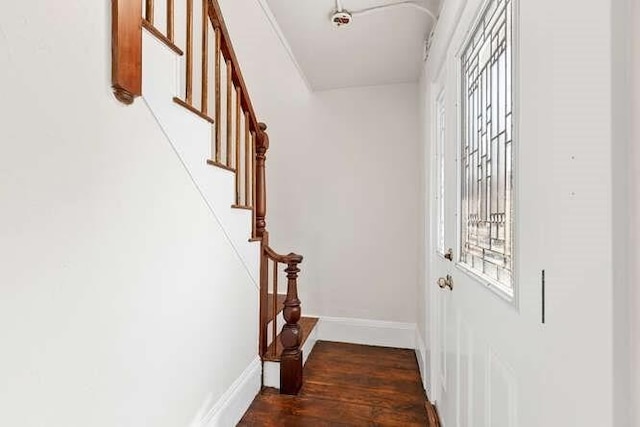 9 Foster St Unit 2, Gloucester, MA 01930 - doorway to outside featuring stairway and wood finished floors