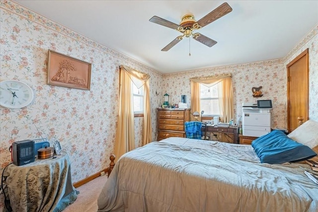 bedroom with light carpet and ceiling fan