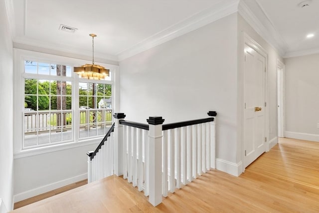 2 Percy Rd, Lexington, MA 02421 - staircase featuring a chandelier, wood finished floors, baseboards, and crown molding