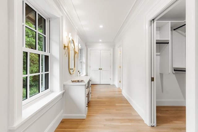 2 Percy Rd, Lexington, MA 02421 - corridor featuring plenty of natural light, baseboards, ornamental molding, light wood-style floors, and recessed lighting