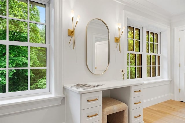 2 Percy Rd, Lexington, MA 02421 - bathroom featuring wood finished floors, baseboards, and ornamental molding