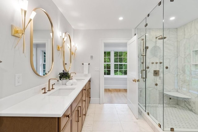 2 Percy Rd, Lexington, MA 02421 - bathroom with double vanity, a marble finish shower, baseboards, recessed lighting, and tile patterned flooring