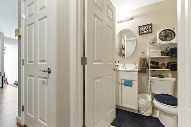 450 Somerset Ave Unit 3-6, Taunton, MA 02780 - bathroom featuring toilet, vanity, and wood finished floors