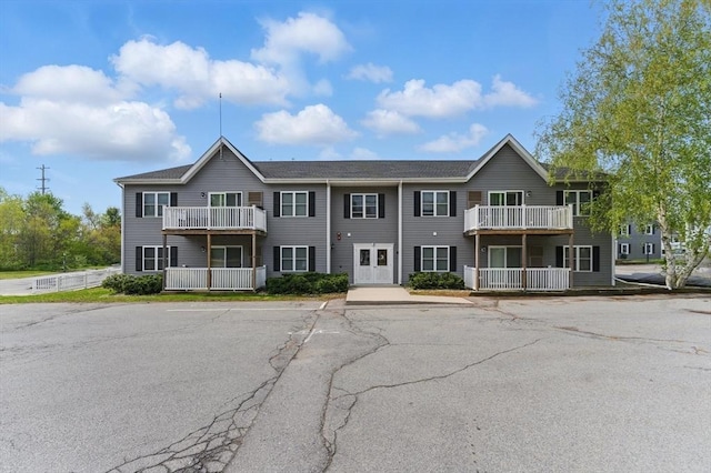 450 Somerset Ave Unit 3-6, Taunton, MA 02780 - view of property with a balcony and uncovered parking