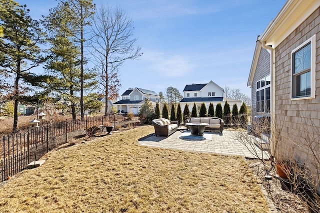 view of yard featuring a fenced backyard, an outdoor hangout area, and a patio