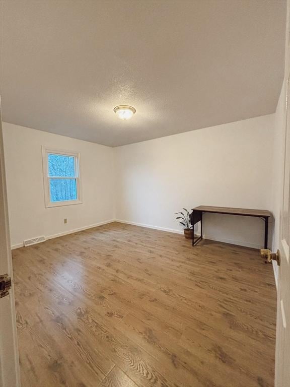 interior space with hardwood / wood-style floors