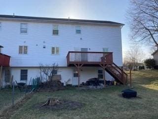 back of house with a yard and a wooden deck