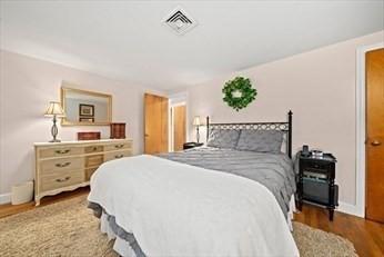 bedroom featuring hardwood / wood-style floors