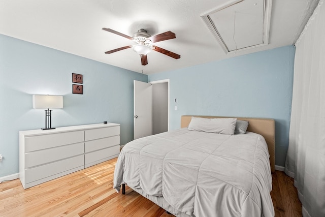 bedroom featuring hardwood / wood-style flooring and ceiling fan