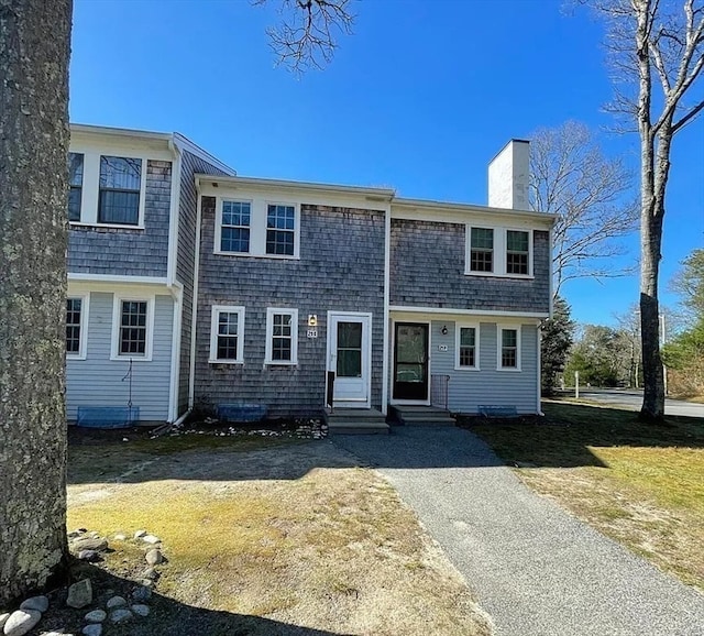 view of front of property with a front lawn