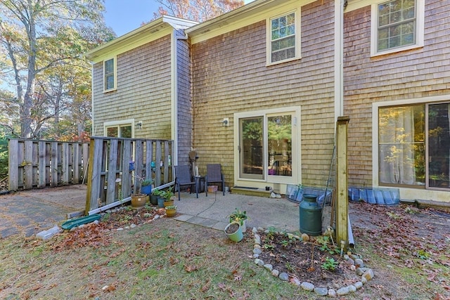 back of house featuring a patio