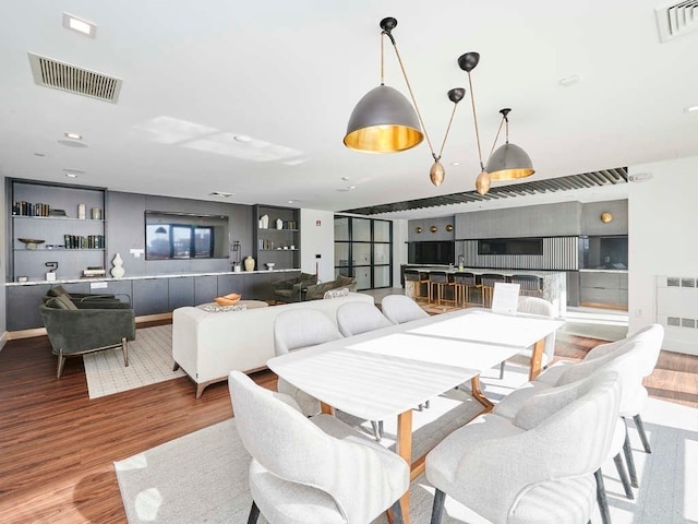 dining room with light hardwood / wood-style floors