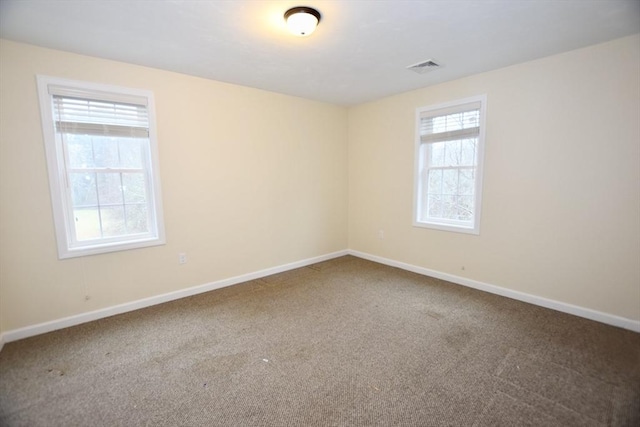 view of carpeted spare room