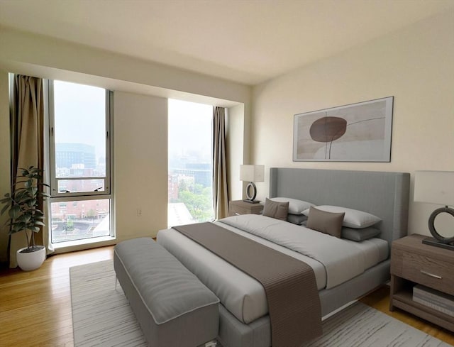 2 Earhart St Unit Ph6, Cambridge, MA 02141 - bedroom featuring light wood-style flooring