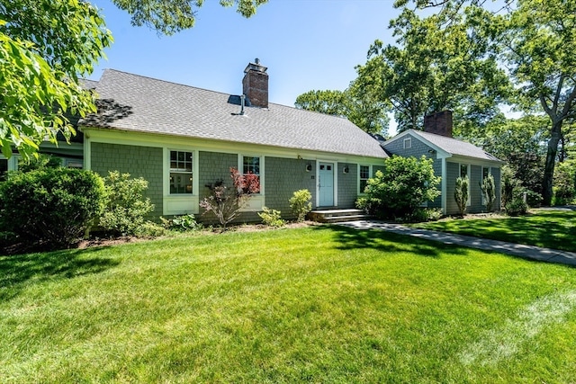 ranch-style house with a front lawn