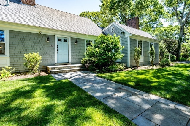 view of front of house with a front lawn