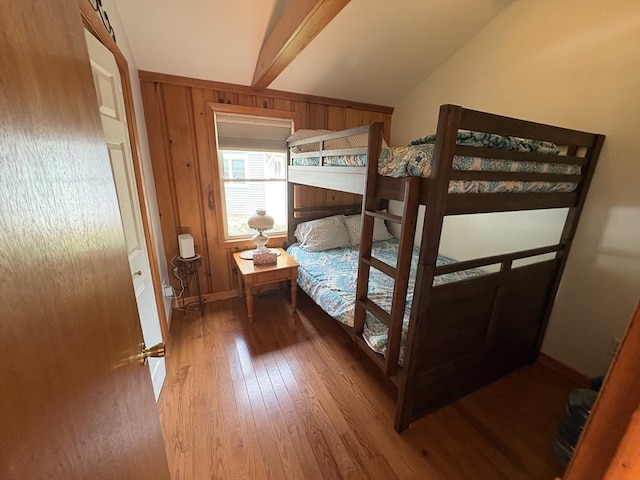 10 Brandon St, Holland, MA 01521 - bedroom with baseboards, vaulted ceiling with beams, and wood-type flooring