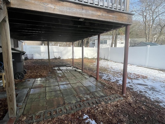 view of snow covered patio