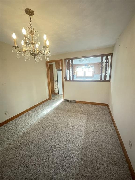 view of carpeted spare room