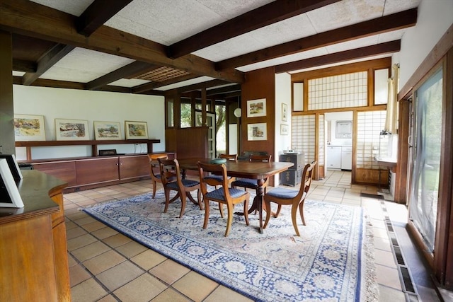 dining area with light tile patterned floors and beamed ceiling