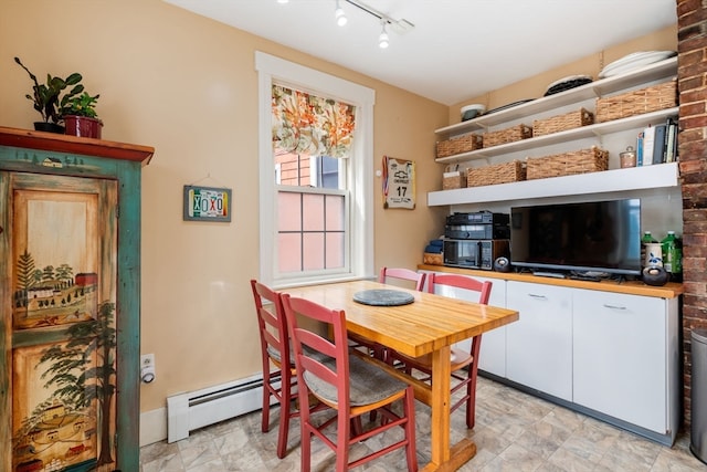 dining room with baseboard heating