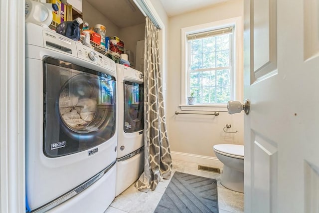 121 Adams Rd, East Brookfield, MA 01515 - washroom featuring washer / dryer and light tile patterned floors
