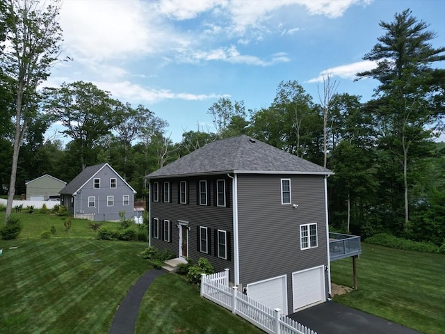 121 Adams Rd, East Brookfield, MA 01515 - view of side of home with driveway, an attached garage, a yard, and roof with shingles