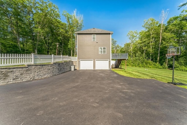 121 Adams Rd, East Brookfield, MA 01515 - view of side of home with stairs, driveway, a garage, and a deck