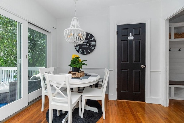 94 Circuit Rd, Winthrop, MA 02152 - dining space with wood finished floors and a chandelier